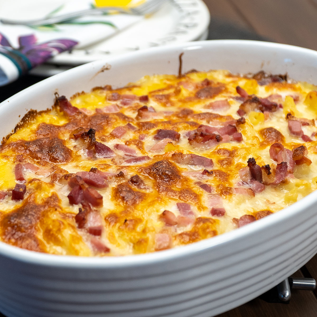Baked penne with creamy corn sauce and bacon fresh from the oven.