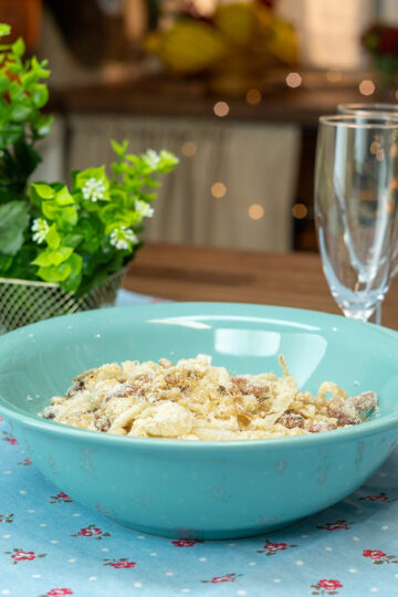 Brazilian bacon and plantain farofa served in a bowl.