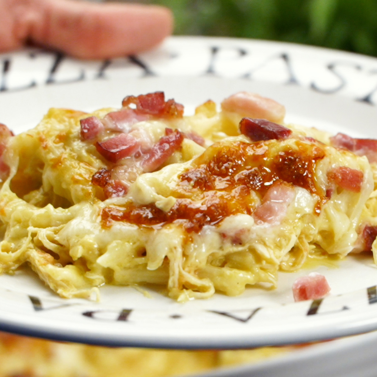Creamy chicken penne with corn sauce and bacon served hot.