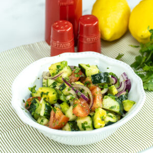 Avocado lemon salad ready to serve in a bowl.