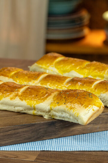 Ham and cheese stuffed bread removed from the pan and ready to slice.