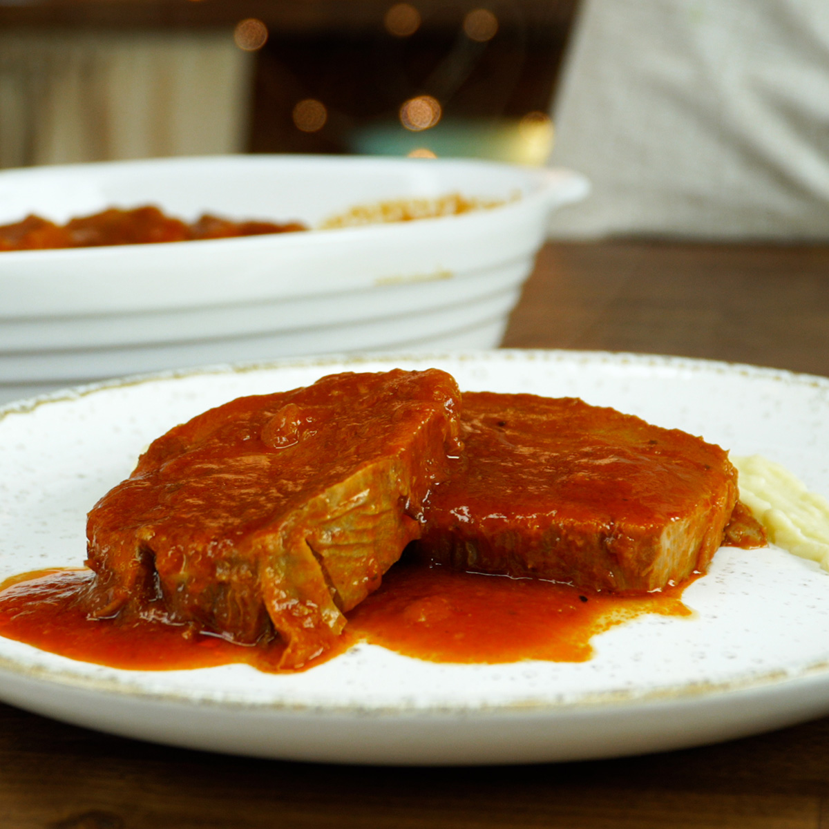 Pressure cooker eye of round roast served with a thick sauce.