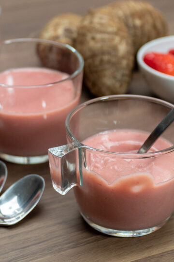 Strawberry yam pudding being served in small dessert cups.